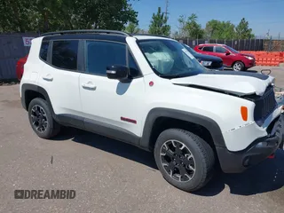 2023 Jeep Renegade Trailhawk with VIN ZACNJDC13PPP66434, listed as a IAAI auction lot 39951357 with 10,517 mi miles and . Bid and sale history available at DreamBid. Image 1.