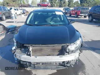 2016 Honda Civic Sedan EX-L with VIN 19XFC1F73GE215112, listed as a IAAI auction lot 42093218 with 67,233 mi miles. Bid and sale history available at carsss.com. Image 13.