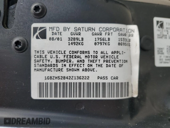 2002 Saturn SL z VIN 1G8ZH52842Z136222, wystawiony jako Copart lot #53687125 z przebiegiem 133 327 mil mil oraz Szkoda całkowita • Salvage title. Historia ofert i sprzedaży dostępna na DreamBid. Obrazek 12.