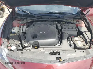 2018 Nissan Maxima SL z VIN 1N4AA6AP4JC375542, wystawiony jako Copart lot #57691275 z przebiegiem 82 504 mil mil oraz Szkoda całkowita • Salvage title. Historia ofert i sprzedaży dostępna na DreamBid. Obrazek 11.