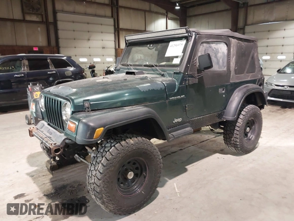 1999 Jeep Wrangler SE with VIN 1J4FY29P4XP457291, listed as a IAAI auction lot 41549758 with 133,362 mi miles and . Bid and sale history available at DreamBid. Image 2.