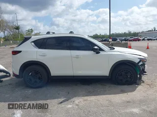 2021 Mazda CX-5 Signature with VIN JM3KFBEY0M0436264, listed as a IAAI auction lot 41568892 with 36,833 mi miles. Bid and sale history available at carsss.com. Image 13.