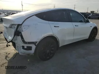 2021 Tesla Model Y Long Range z VIN 5YJYGDEE7MF090698, wystawiony jako Copart lot #44192555 z przebiegiem 78 907 mil mil oraz Szkoda całkowita • Salvage title. Historia ofert i sprzedaży dostępna na DreamBid. Obrazek 3.