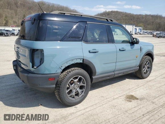 2021 Ford Bronco Sport Badlands z VIN 3FMCR9D92MRA00695, wystawiony jako Copart lot #53674135 z przebiegiem 51 742 mil mil oraz Szkoda całkowita • Salvage title. Historia ofert i sprzedaży dostępna na DreamBid. Obrazek 3.