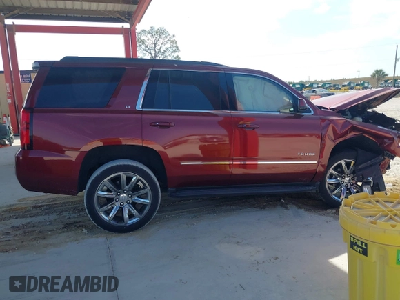2018 Chevrolet Tahoe LT with VIN 1GNSCBKC5JR385935, listed as a IAAI auction lot 42116288 with 50,890 mi miles and . Bid and sale history available at DreamBid. Image 13.