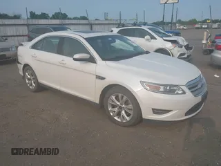 2011 Ford Taurus SEL z VIN 1FAHP2EW8BG183171, wystawiony jako IAAI lot #42375400 z przebiegiem 122 566 mil mil oraz . Historia ofert i sprzedaży dostępna na DreamBid. Obrazek 1.