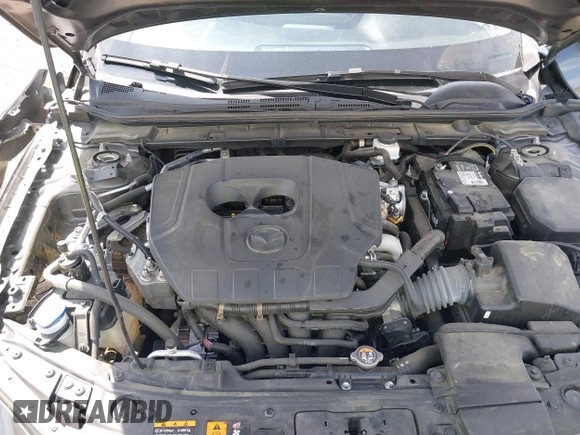 2023 Mazda 3 S Select with VIN JM1BPAKM3P1615785, listed as a IAAI auction lot 42064302 with 63,928 mi miles and . Bid and sale history available at DreamBid. Image 10.