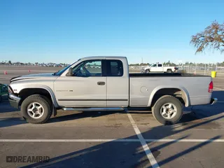 2000 Dodge Dakota Sport with VIN 1B7GG22N6YS690223, listed as a IAAI auction lot 41244256 with 147,443 mi miles. Bid and sale history available at carsss.com. Image 14.