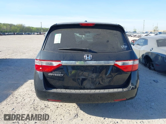 2012 Honda Odyssey EX-L with VIN 5FNRL5H6XCB016801, listed as a IAAI auction lot 42112141 with 164,671 mi miles and . Bid and sale history available at carsss.com. Image 16.