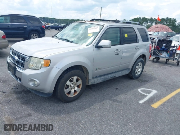 2009 Ford Escape Hybrid z VIN 1FMCU49399KB18857, wystawiony jako IAAI lot #42502324 z przebiegiem 227 828 mil mil oraz . Historia ofert i sprzedaży dostępna na DreamBid. Obrazek 2.