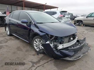 2023 Toyota Corolla Hybrid LE with VIN JTDBCMFE8PJ003081, listed as a IAAI auction lot 41041004 with 19,146 mi miles. Bid and sale history available at carsss.com. Image 1.