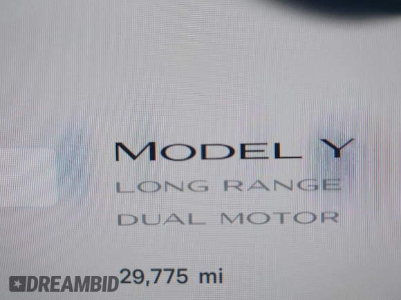2023 Tesla Model Y Long Range with VIN 7SAYGDEE8PF612438, listed as a IAAI auction lot 41991145 with 29,775 mi miles and . Bid and sale history available at carsss.com. Image 15.