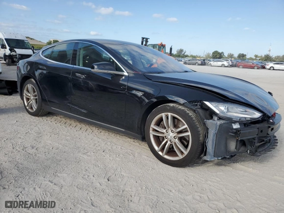 2015 Tesla Model S 85 kWh Battery with VIN 5YJSA1S12FFP67764, listed as a Copart auction lot 51000664 with 70,034 mi miles. Bid and sale history available at carsss.com. Image 4.