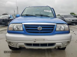 2005 Suzuki Grand Vitara LX with VIN JS3TD62V354200952, listed as a Copart auction lot 60374465 with 134,957 mi miles and Salvage title. Bid and sale history available at DreamBid. Image 5.