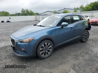 2019 Mazda CX-3 Touring z VIN JM1DKFC7XK1406484, wystawiony jako Copart lot #60127195 z przebiegiem 86 368 mil mil oraz Szkoda całkowita • Salvage title. Historia ofert i sprzedaży dostępna na DreamBid. Obrazek 1.