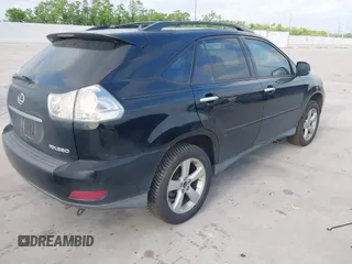 2008 Lexus RX with VIN 2T2HK31U38C064322, listed as a IAAI auction lot 42074366 with 241,459 mi miles. Bid and sale history available at carsss.com. Image 4.