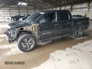 2015 Nissan Titan SL with VIN 1N6AA0ED1FN503994, listed as a Copart auction lot 39525224 with 104,353 mi miles and Salvage Title. Bid and sale history available at carsss.com. Image 1.