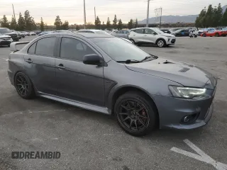 2010 Mitsubishi Lancer Evolution GSR with VIN JA32W8FV1AU027600, listed as a Copart auction lot 84328974 with 88,417 mi miles and Salvage Title. Bid and sale history available at DreamBid. Image 4.