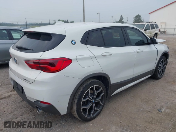 2018 BMW X2 xDrive28i z VIN WBXYJ5C3XJEF76384, wystawiony jako IAAI lot #42439783 z przebiegiem 85 742 mil mil oraz . Historia ofert i sprzedaży dostępna na DreamBid. Obrazek 4.