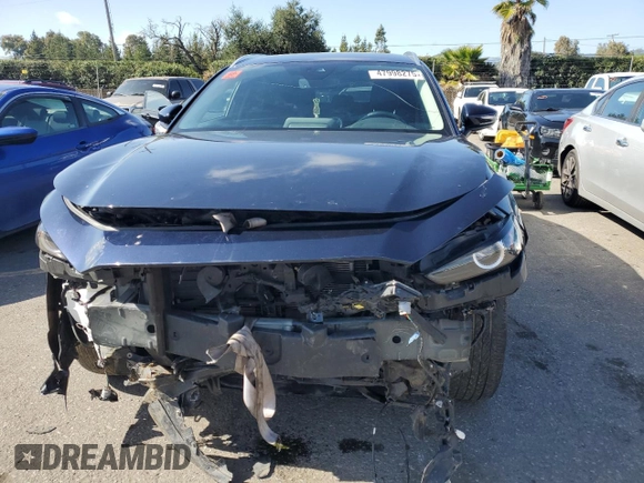 2023 Mazda CX-30 S Carbon Edition with VIN 3MVDMBCM1PM582423, listed as a Copart auction lot 47998275 with 35,412 mi miles and Salvage title. Bid and sale history available at DreamBid. Image 5.