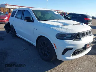 2021 Dodge Durango R/T with VIN 1C4SDJCT4MC663939, listed as a IAAI auction lot 40950558 with 52,054 mi miles and . Bid and sale history available at DreamBid. Image 1.
