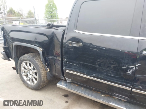 2014 GMC Sierra 1500 Denali z VIN 3GTU2WEJ0EG319322, wystawiony jako IAAI lot #41947884 z przebiegiem 216 063 mil mil oraz . Historia ofert i sprzedaży dostępna na DreamBid. Obrazek 13.
