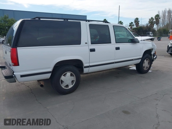 1997 Chevrolet Suburban with VIN 3GNFK16R9VG187426, listed as a IAAI auction lot 41678063 with 131,387 mi miles. Bid and sale history available at carsss.com. Image 4.