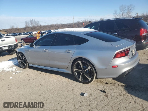 2017 Audi RS 7 Prestige z VIN WUAWAAFC8HN903853, wystawiony jako Copart lot #86112964 z przebiegiem 57 313 mil mil oraz Szkody całkowita. Historia ofert i sprzedaży dostępna na DreamBid. Obrazek 2.