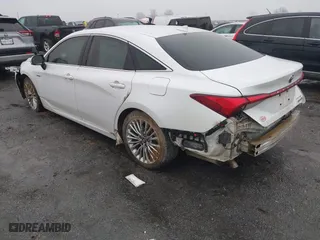 2020 Toyota Avalon Hybrid Limited with VIN 4T1C21FB9LU016373, listed as a IAAI auction lot 41536148 with 104,675 mi miles. Bid and sale history available at carsss.com. Image 3.