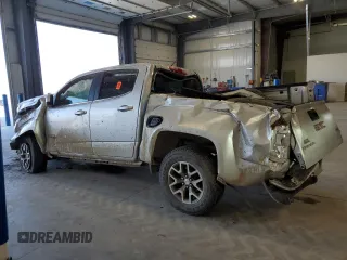 2015 GMC Canyon 4WD SLE with VIN 1GTG6BE36F1263317, listed as a Copart auction lot 53967805 with 129,590 mi miles and Salvage title. Bid and sale history available at DreamBid. Image 2.