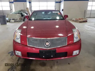 2004 Cadillac XLR z VIN 1G6YV34A045602305, wystawiony jako Copart lot #48484845 z przebiegiem 52 897 mil mil oraz Szkoda całkowita • Salvage title. Historia ofert i sprzedaży dostępna na DreamBid. Obrazek 5.