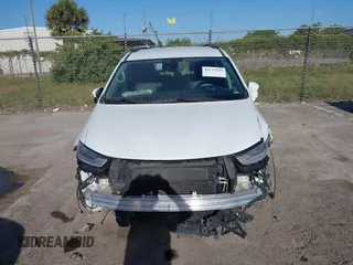 2022 Chrysler Pacifica Touring L with VIN 2C4RC1BGXNR233654, listed as a IAAI auction lot 42137632 with 73,899 mi miles and . Bid and sale history available at DreamBid. Image 12.