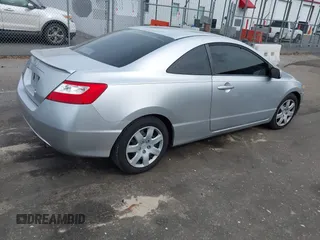 2007 Honda Civic Cpe LX with VIN 2HGFG12667H577166, listed as a IAAI auction lot 41983064 with 98,553 mi miles. Bid and sale history available at carsss.com. Image 4.