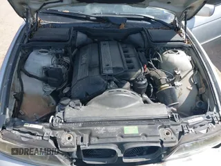 2003 BMW 5 Series 530iA with VIN WBADT63443CK38704, listed as a IAAI auction lot 41779122 with 103,198 mi miles. Bid and sale history available at carsss.com. Image 10.