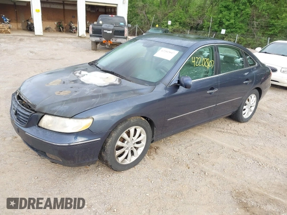 2007 Hyundai Azera SE with VIN KMHFC46F47A195122, listed as a IAAI auction lot 42202807 with 70,694 mi miles and . Bid and sale history available at DreamBid. Image 2.