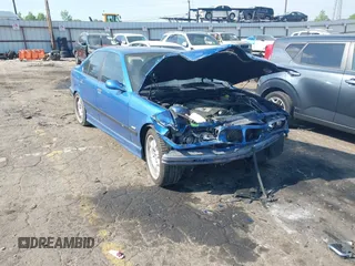 1998 BMW M3 z VIN WBSCD9324WEE08785, wystawiony jako IAAI lot #42065988 z przebiegiem 202 400 mil mil oraz . Historia ofert i sprzedaży dostępna na DreamBid. Obrazek 1.