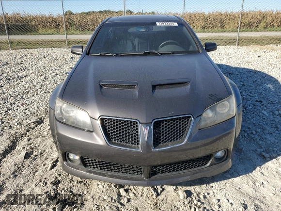 2009 Pontiac G8 with VIN 6G2ER57749L235662, listed as a Copart auction lot 73972344 with 146,384 mi miles and Salvage Title. Bid and sale history available at DreamBid. Image 5.