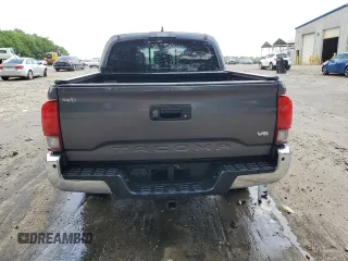2018 Toyota Tacoma SR5 с VIN 5TFAZ5CN3JX071474, выставлен на аукционе Copart как лот 54677335 с пробегом 86 866 миль миль и Списание • Salvage title. История ставок и продаж доступна на DreamBid. Изображение 6.