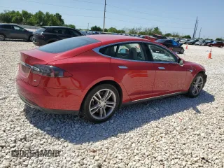 2013 Tesla Model S with VIN 5YJSA1CN1DFP26864, listed as a Copart auction lot 52029485 with 63,260 mi miles and Salvage Title. Bid and sale history available at DreamBid. Image 3.