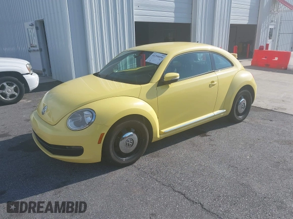 2013 Volkswagen Beetle 2.5L with VIN 3VWHX7AT7DM613197, listed as a IAAI auction lot 41298890 with 130,219 mi miles and . Bid and sale history available at DreamBid. Image 19.