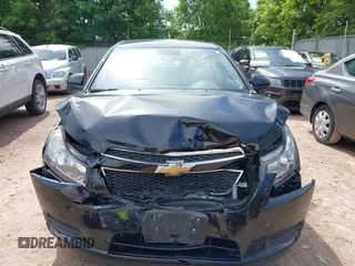 2014 Chevrolet Cruze 1LT with VIN 1G1PC5SB5E7433631, listed as a IAAI auction lot 42518491 with 99,962 mi miles and . Bid and sale history available at DreamBid. Image 12.