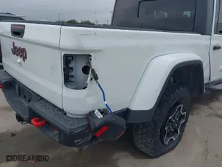 2020 Jeep Gladiator Rubicon with VIN 1C6JJTBG9LL171398, listed as a IAAI auction lot 41390927 with 42,812 mi miles. Bid and sale history available at carsss.com. Image 6.