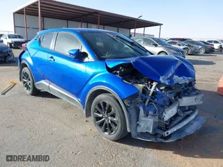 2019 Toyota C-HR XLE with VIN NMTKHMBX3KR098510, listed as a IAAI auction lot 41289899 with 112,981 mi miles. Bid and sale history available at carsss.com. Image 1.