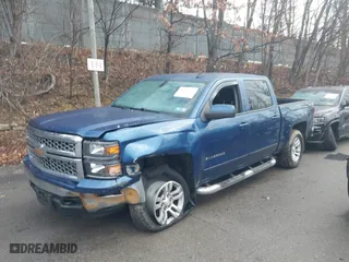 2015 Chevrolet Silverado 1500 LT with VIN 3GCUKREC5FG468054, listed as a IAAI auction lot 41459655 with 157,236 mi miles. Bid and sale history available at carsss.com. Image 2.