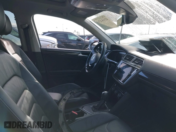 2018 Volkswagen Tiguan SEL Premium with VIN 3VV5B7AX5JM176434, listed as a IAAI auction lot 41684514 with 47,988 mi miles and . Bid and sale history available at DreamBid. Image 5.