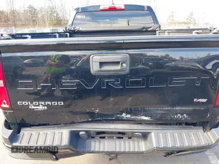 2021 Chevrolet Colorado 2WD LT with VIN 1GCGSCEN1M1111865, listed as a IAAI auction lot 41650905 with 58,389 mi miles and . Bid and sale history available at DreamBid. Image 16.