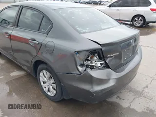 2012 Honda Civic LX z VIN 2HGFB2F51CH600546, wystawiony jako IAAI lot #41920265 z przebiegiem 196 599 mil mil oraz . Historia ofert i sprzedaży dostępna na DreamBid. Obrazek 6.