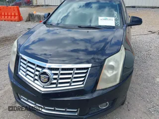 2013 Cadillac SRX Performance Collection z VIN 3GYFNDE35DS555248, wystawiony jako IAAI lot #42001494 z przebiegiem 268 410 mil mil oraz . Historia ofert i sprzedaży dostępna na DreamBid. Obrazek 6.