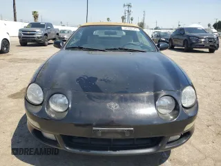 1997 Toyota Celica GT with VIN JT5FG02TXV0044202, listed as a Copart auction lot 52166575 with 167,292 mi miles and Salvage Title. Bid and sale history available at carsss.com. Image 5.