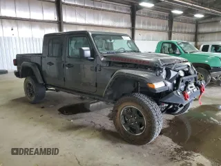 2021 Jeep Gladiator Rubicon with VIN 1C6JJTBG6ML579391, listed as a Copart auction lot 54626145 with 38,847 mi miles and Salvage title. Bid and sale history available at DreamBid. Image 4.
